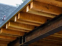 the roof of a house with wooden beams