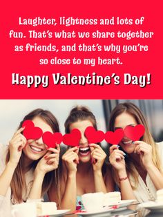 three women holding up hearts with the words happy valentine's day