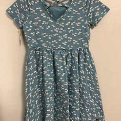 Cute Floral Blue Dress Nwt Casual Cotton Twirl Dress With Short Sleeves, Casual Blue Short Sleeve Dresses, Blue Fitted Cotton Twirl Dress, Fitted Blue Cotton Twirl Dress, Blue Cotton Dresses With Short Sleeves, Casual Light Blue Cotton Dress, Cute Blue Cotton Dress, Casual Cotton Fitted Twirl Dress, Light Blue Cotton V-neck Dress