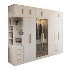 a white closet with gold handles and drawers