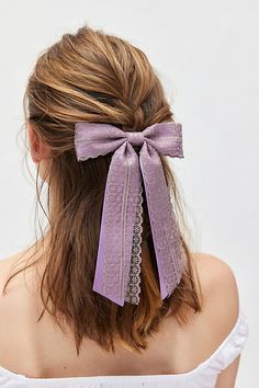 Dolly satin lace hair bow barrette. Lacey satin hair bow complete with a secure clip. Features Dolly satin lace hair bow barrette Lacey satin hair bow clip Content + Care Textile, mixed metal Spot clean Imported | Dolly Satin Lace Hair Bow Barrette in Purple Dove, Women's at Urban Outfitters Lavender Hair Accessories, Lace Hair Bow, Satin Hair Bow, Bow Barrette, Hair Bow Clip, Lavender Hair, Bow Clip, Lace Hair, Bow Hair Clips