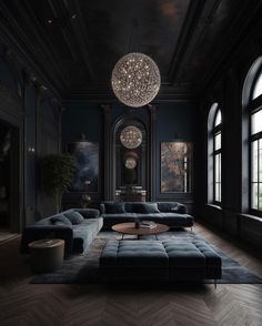 an elegant living room with black walls and wood flooring is lit by a chandelier that hangs from the ceiling