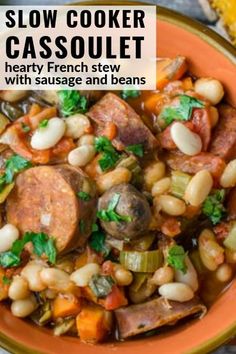 slow cooker casserole with hearty french stew and beans in an orange bowl