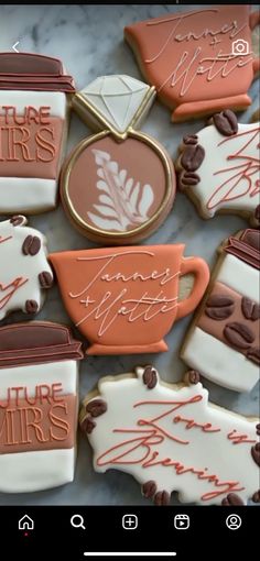 decorated cookies with writing and coffee cups on them