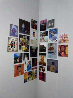 a wall with many different pictures on it