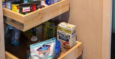 an organized pantry with canned food and snacks