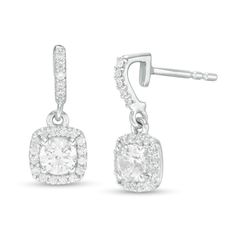 She'll appreciate the contemporary appeal of these smart diamond drop earrings. Fashioned in 14K white gold, each clever drop features a 1/4 ct. diamond sparkling a cushion-shaped frame of diamonds. The diamond-lined hook-shaped post adds further shimmer to the design. Radiant with 3/4 ct. t.w. of diamonds and a brilliant buffed luster, these earrings secure comfortably with friction backs. Cushion Cut Halo Diamond Earrings, White Cushion Cut Diamond Earrings For Formal Occasions, Elegant Cushion Cut Diamond Earrings, Formal Cushion Cut Earrings With Diamond Accents, Formal Diamond Earrings With Cushion Cut And Diamond Accents, Formal Cushion Cut Diamond Earrings With Diamond Accents, Cushion Cut Sterling Silver Diamond Earrings For Formal Occasions, Cushion Cut Diamond Earrings For Formal Occasions, Formal Fine Jewelry Cushion Cut Diamond Earrings