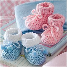 crocheted baby shoes and booties are shown