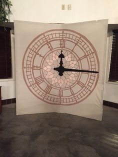 a large clock on the wall in a room