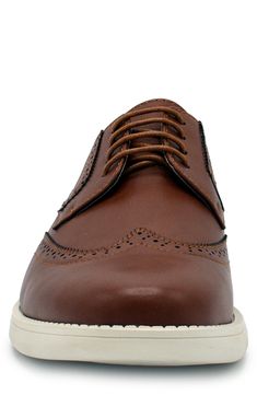 A faux leather pair of sneakers are elevated with wingtip stitching for casual-yet-cool style. Round toe Lace-up vamp Synthetic upper/rubber sole
 Imported Casual Low-top Lace-up Shoes With Brogue Detailing, Casual Wingtip Oxford Lace-up Shoes, Casual Oxford Wingtip Lace-up Shoes, Casual Oxford-style Lace-up Wingtip Shoes, Casual Low-top Oxfords With Brogue Detailing, Casual Wingtip Lace-up Shoes With Textured Sole, Casual Wingtip Lace-up Shoes With Contrast Sole, Casual Brown Oxfords With Perforated Toe Box, Casual Brown Oxfords With Contrast Sole