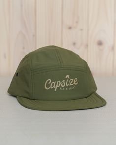 Take The Capsize Packable Loden Camper Cap on your next fishing trip and stay cool all day long! This hat is lightweight and breathable and the float insert ensures that the cap will stay afloat if it falls in the water. It has a low crown 5 panel profile and a Capsize Fly Fishing Print on the front. Unstructured Loden Camper Cap Foam Front Panel float insert Lightweight & Breathable 64% Cotton, 36% Nylon Flexible Flat Visor Low Profile five panel with Plastic Buckle Closure One size fits al Packable Outdoor Cap, Packable Cap For Outdoor, Lightweight Outdoor Snapback Cap, Lightweight Snapback Cap For Outdoor, Lightweight Khaki Hats For Outdoor Activities, Adjustable 5-panel Baseball Cap For Fishing, Khaki Snapback Hat For Outdoor With Flat Bill, Outdoor Khaki Snapback Hat With Flat Bill, Khaki Flat Bill Snapback Hat For Outdoor