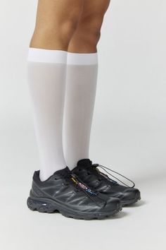 Essential knee highs in the softest sheer knit. Content + Care 96% Nylon, 4% spandex Hand wash Imported Size + Fit Knee length | Classic Sheer Knee High Sock in White, Women's at Urban Outfitters Knee Length White Socks, Gym Socks, White Knee High Socks, Socks Gym, Sheer Knit, Knee Highs, White Socks, High Knees, Knee High Socks