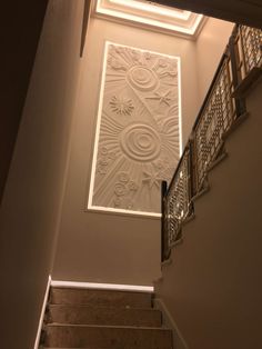 the staircase is decorated with an intricate design