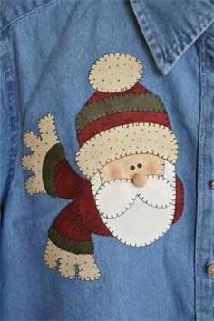 a jean jacket with a santa clause on it