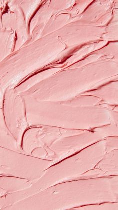 a close up view of some pink paint