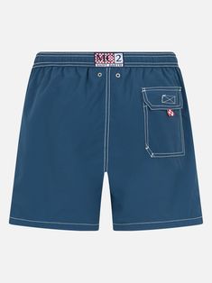 Introducing our Patmos swim shorts, crafted from textured polyester fabric, offering a cotton-like touch. Enhanced with contrast stitching and drawstring, as well as the embroidered exclusive Saint Barth logo detail at the bottom leg. Features a back pocket with flap and velcro closure. This version is made from fast-drying seersucker fabric with a vertical pinstripe pattern. Man Patmos mid-length swim shortsFast dry seersucker fabricSky blue plain colorExclusive Saint Barth logo detail at the b Blue Bottoms With Contrast Stitching For Summer, Blue Swim Trunks With Side Pockets, Nylon Beachwear Bottoms With Pockets, Beachwear Nylon Bottoms With Pockets, Nylon Beachwear Bottoms With Side Pockets, Beachwear Nylon Bottoms With Side Pockets, Beachwear Bottoms With Side Pockets For Pool, Navy Swim Trunks With Pockets For Summer, Navy Nylon Shorts