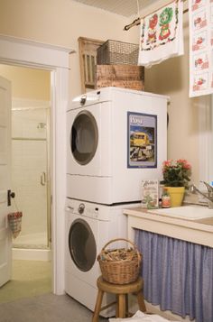 a washer and dryer in a small room