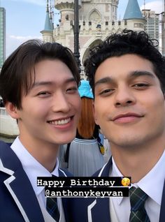 two young men standing next to each other in front of a castle with the words happy birthday anthony ryan