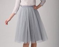 This Tulle Skirt is the ideal Bridesmaid Dress or Wedding Skirt and can be made in ANY color, ANY length, and ANY size. This Custom Skirt is lined with a soft satin fabric of the same or contrasting color as the tulle. ALL ITEMS HANDMADE BY ME IN USA The satin waistband is flat with zipper and hook/eye closure in back. Elastic can be added to the back of the waistband, however only allows for a little wiggle room. Dress it down with a denim shirt or formal with a lace top. A MUST HAVE IN YOUR CL Tulle Skirt Wedding, Skirt Bridesmaid Dresses, Tulle Skirt Bridesmaid, Grey Tulle Skirt, Custom Skirt, Wedding Boards, Ballerina Skirt, Morning Lavender, Tulle Skirt Black