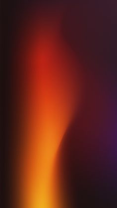 an abstract blurry background with orange and purple colors