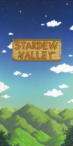 a wooden sign that says stardew valley on the side of a green mountain