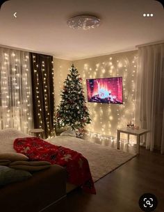 a living room decorated for christmas with lights on the walls and a tree in the corner