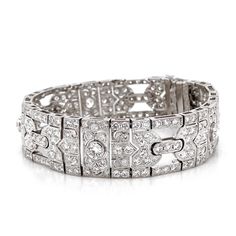 A beautiful Art Deco and retro vintage inspired diamond platinum bracelet. Covered in stunning round cut white natural diamonds 11.29 ct in total. Diamonds get that extra sparkle against the silver brilliance of the platinum 950 metal. Diamonds are all natural in G-H Color Clarity VS. Length: 17.3 cm Width. 1.5 cm Weight: 48.5 g [shortcode] [video] [/video] [/shortcode] White Gold Hoop Earrings, Vintage Wedding Jewelry, Platinum Bracelet, White Gold Hoops, Platinum Earrings, Art Deco Bracelet, 18k Gold Jewelry, Art Deco Inspired, Yellow Diamond