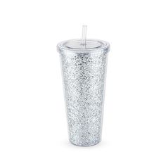 the glitter tumbler cup has a straw in it