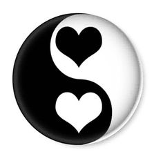 yin button with two hearts in the middle