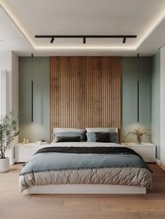 a large bed sitting in the middle of a bedroom next to a tall wooden wall