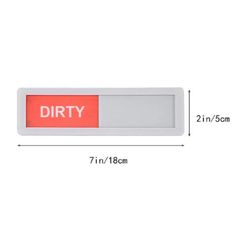 a red and white sign with the word dirty on it, next to a ruler