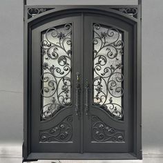 gid iron front double door with arched top and rain glass Exterior Doors With Sidelights, Double Front Entry Doors, Steel French Doors, Stone Exterior Houses, Metal Front Door, Iron Front Door, Iron Entry Doors, Elegant Entryway, Outdoor Fireplace Patio