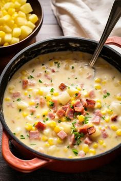 a pot filled with corn and ham soup