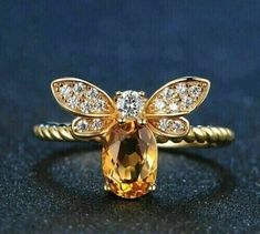 ad eBay - Find many great new & used options and get the best deals for 3Ct Oval Lab-Created Yellow Citrine WeddingHoney Bee Ring 14K Yellow Gold Finish at the best online prices at eBay! Free shipping for many products! Topaz Engagement Ring Yellow, Bee Ring, Silver Wedding Jewelry, Bee Jewelry, Topaz Engagement Ring, Gold Bee, Jewelry Wedding Rings, Citrine Ring, Wedding Rings For Women