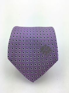 "Mens 100% silk lavendar necktie perfect for weddings or the office. Features a lavendar background with black specks ourlined in white. Availanle as a extra long neck tie. Handmade from 100% silk, this special collection features a .75\" Eds Neckties logo at the bottom right front corner of every tie and a larger logo located on the tipping (Back of the tie). The label features the collection name (Nathaniel Alexandria) Named after my son Nathaniel and my daughter Alexandria. Expertly hand-made Lavender Background, Purple Gothic, Make A Tie, White Goth, Goth Wedding, Navy Tie, Tie Men's, Long Neck, Wedding Ties