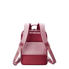 a pink backpack with straps on the front and back side, sitting against a white background