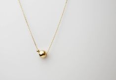 "Minimalistic, classy and elegant! This necklace is perfect for any occasion. Shinny Beads in sterling silver or gold filled. A perfectly Shinny ball bead pendants threated on a delicate feminine 14K gold filled chain. Simple and dainty gold ball necklace, featuring 14K gold filled ball and chain /Sterling silver ball and chain. ■ Turn this necklace also a Back necklace! Check out our clip on Back Necklace Chain : https://www.etsy.com/listing/250871895/mini-bead-back-necklace-dainty-beck-drop?re Dainty Ball Chain Necklaces As Gifts, Dainty Ball Chain Necklace For Gift, Minimalist Ball Chain Jewelry Gift, Minimalist Ball Chain Necklace As Gift, Minimalist Ball Chain Necklace For Gift, Elegant Ball Chain Necklace As Gift, Elegant Ball Chain Necklace For Gift, Minimalist Wedding Necklace With Satellite Chain, Necklaces Modern