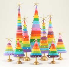 a group of colorful christmas trees sitting next to each other