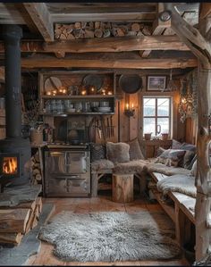 an old fashioned log cabin with wood burning stove