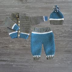 "Wrap your little one in warmth and style with this handmade crochet baby sweater set, perfect for keeping cozy in cooler weather. The set includes a soft sweater, matching pants, and a snug hat, all crafted with love from gentle, baby-friendly yarn that's kind to delicate skin. Available in sizes from newborn to 6 months, this set makes an ideal baby shower gift, bringing charm and comfort to any little wardrobe. Whether it's for a stroll outside or a cozy day indoors, this adorable outfit keep Crochet Baby Boy Clothes, Crochet Baby Clothes Boy, Crochet Baby Sweater Sets, Baby Jumpers, Cute Winter Outfit, Crochet Baby Sweater, Gentle Baby, Crochet Baby Boy