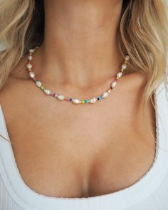 Colorful Beaded Choker with Freshwater Pearls Length of Choker: approx. 15.5 - 17.5 inches 18K Gold Plated Stainless Steel This necklace is made with a real freshwater pearls, therefore each pearl is unique and no two necklaces are alike. Multicolor Beaded Necklace With Pearl Drop, Multicolor Beaded Necklaces With Pearl Drop, Multicolor Pearl Drop Necklace, Multicolor Pearl Drop Beaded Necklace, Multicolor Beaded Necklace With Pearl Pendant, Multicolor Pearl Necklace With Pendant, Two Necklaces, Beaded Choker, Fresh Water