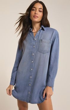 Collared Button front Pocket at chest Hi-lo shirrtail hem shape Length from shoulder 34" Relaxed fit Chambray Tencel: 100% Tencel Tencel Fabric, Chambray Dress, Midi Maxi Dress, Plus Size Swimwear, Long Blouse, Casual Everyday, Front Design, Collar Dress, Dressed Down