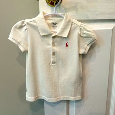 Nwt! Ralph Lauren White Polo Shirt W/ Slight Ruching. Size 24 Mags. Very Cute! Fitted Ralph Lauren Collared T-shirt, Ralph Lauren Fitted Cotton T-shirt, Cute Ralph Lauren Long Sleeve Top, Fitted Ralph Lauren Cotton T-shirt, Fitted Cotton T-shirt By Ralph Lauren, Cute Fitted Ralph Lauren Tops, Fitted Cute Ralph Lauren Tops, Ralph Lauren White Charming Tops, Fitted Ralph Lauren Summer T-shirt