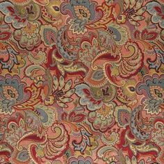 an ornate red and blue rug with lots of paisley designs on it's sides