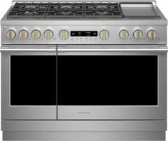 a stainless steel stove with four burners and two oven doors on the front side