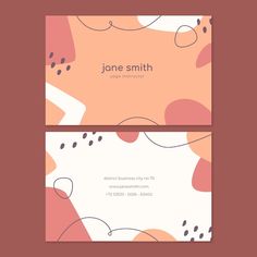 two business cards with abstract shapes and lines in pink, orange and white colors on them