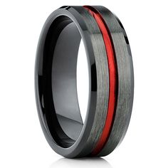 a wedding band with red and black inlays is shown on an iphone screen