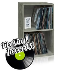 an old record player is next to a book shelf with records on it and the words fix vinyl records