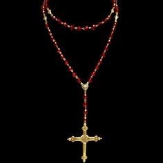 Forgotten Graces, "Seven Joys" Sacred Heart Rosary Necklae in Garnet and Gold features Seven set of ten garnet crystal beads. Inspired by the Seven Joys of the Virgin, it reflects on the a popular devotion to events of the life of the Virgin Mary, arising from a trope of medieval devotional literature and art. While it can be used as a true rosary due to the sacred design, it can also be worn as every day wear. The "Seven Joys" has a 2" two sided cross with a Sacred Heart on one side and a Compa Red Rosary Necklace, Evening Meditation, Jesus Crown, Gold Rosary, Garnet Crystal, Divine Mother, Garnet And Gold, Special Necklace, The Virgin Mary