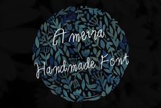 the handmade font is surrounded by blue leaves and green foliage on a black background